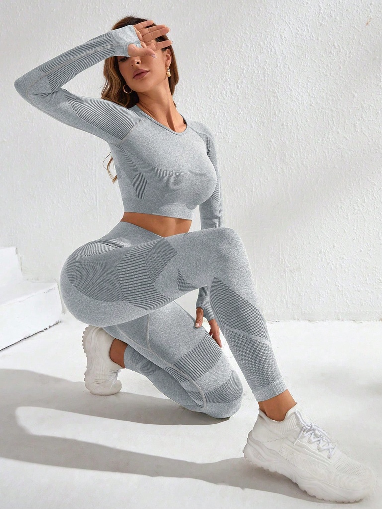 SHEIN Yoga Basic Conjunto deportivo inconsútil con estiramiento alto agujeros de pulgar con estampado de rayas